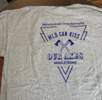 A heather gray short-sleeve t-shirt laid flat, featuring a blue graphic print on the front that reads 'Metachromatic Leukodystrophy', 'MILD CAN KISS', 'OUR AXES', and '#AXELSTRONG' with crossed axes. Two small handwritten size tags reading 'SHORT SLEEVE' and '3YL' are placed near the bottom.